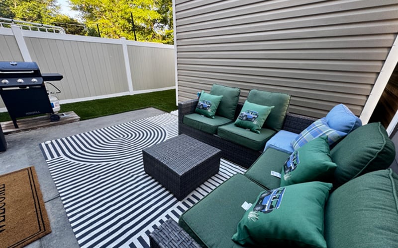 Gas grill with propane included — cook out steps from the kitchen on your private patio