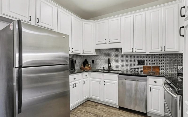 Fully equipped kitchen with stainless appliances for easy beach-week meals